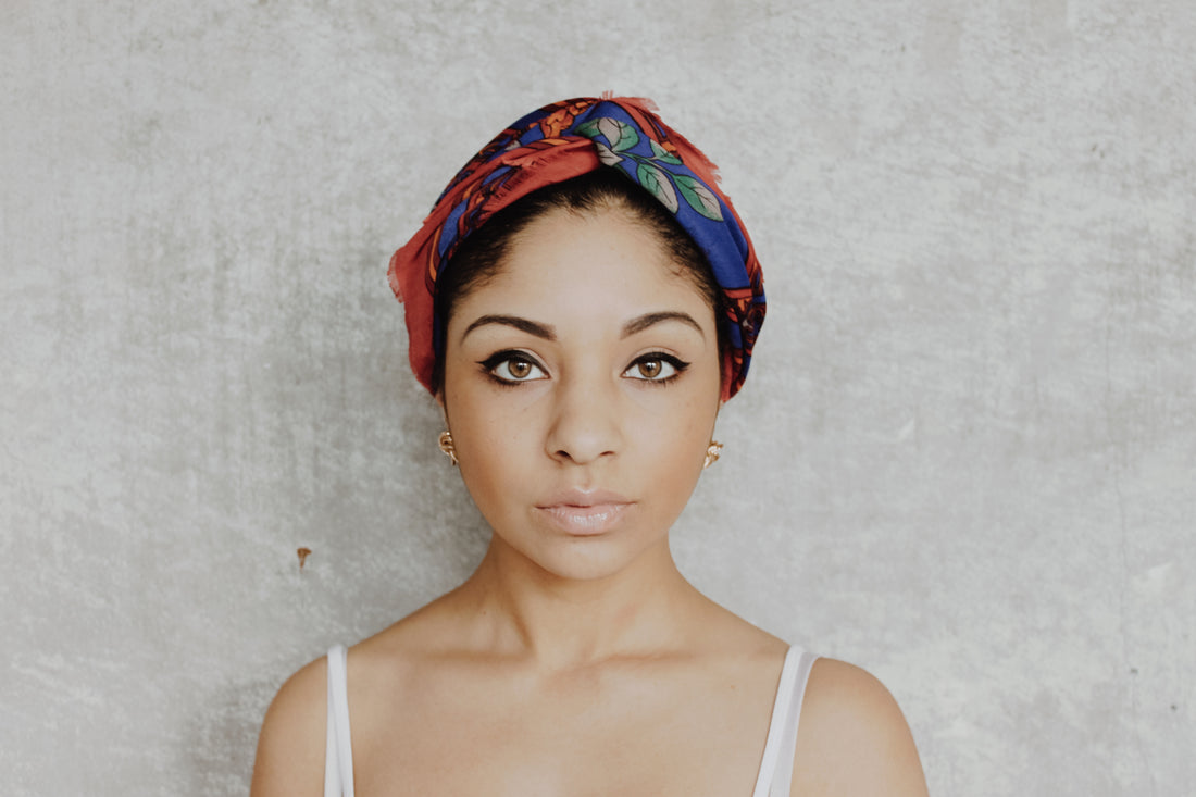 woman of color wearing turban headwrap
