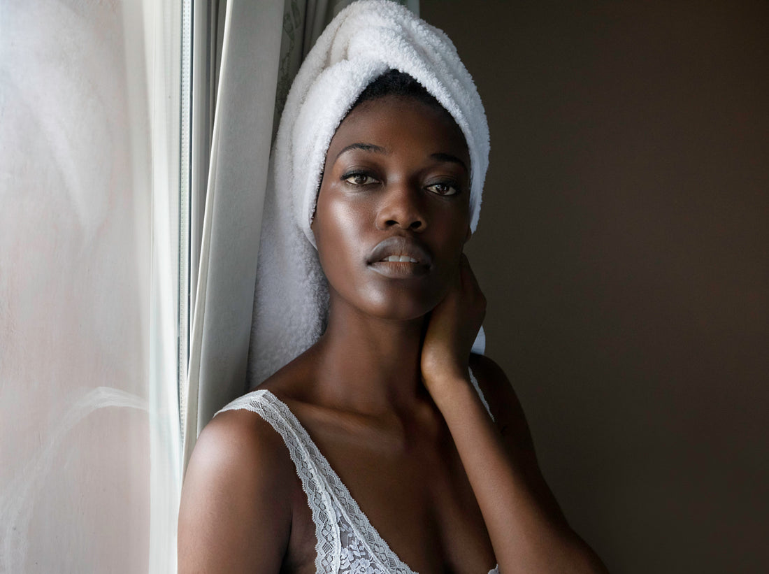 BLACK WOMAN WITH TOWL ON HEAD, CLEAR SKIN